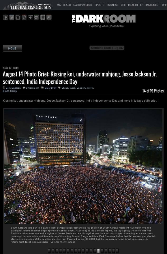 <볼티모어 선> 온라인판은 <로이터>가 보도한 지난 14일 서울광장 촛불집회 모습을 ‘오늘의 사진 뉴스’로 게재했다. ⓒ ‘볼티모어 선’ 온라인 판